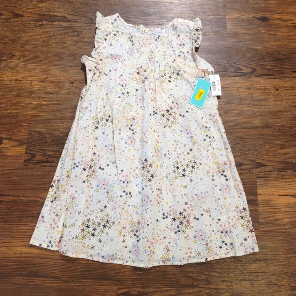 Light airy Dillards stars cream colored smocked spring summer dress. Sz M